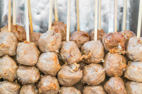 Thai steamed meat snacks being offered in a street food market