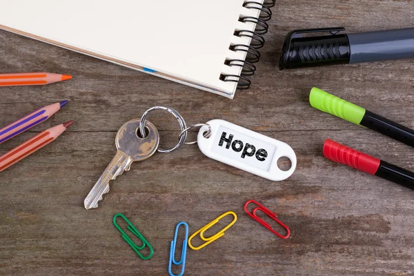 Old key With Hope Text. Wooden texture background with pencils, — Stock Photo, Image
