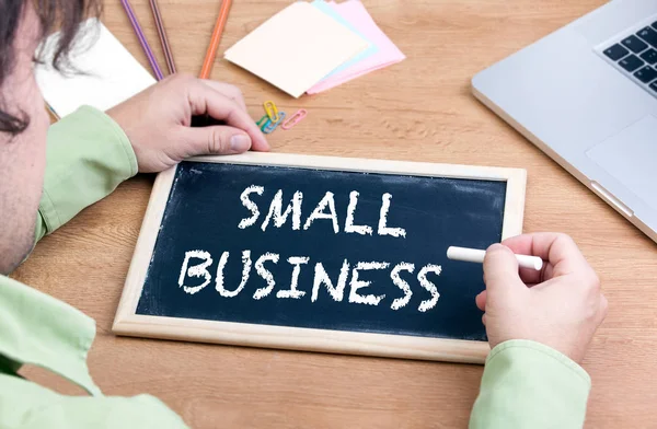 Small Business. Tablica na drewniane biurko — Zdjęcie stockowe