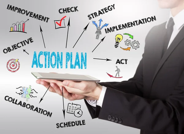 Action Plan koncept, ung man innehar en surfplatta — Stockfoto
