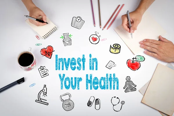 Invest in your health concept. Healty lifestyle background. The meeting at the white office table — Stock Image Invest in your health concept. Healty lifestyle background. The meeting at the white office table Stock Image