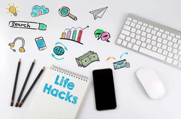 Life Hacks. Computer keyboard and mobile phone on a white table — Stock Photo, Image