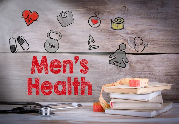 Mens Health. Stos książek i stetoskop na podłoże drewniane — Zdjęcie stockowe