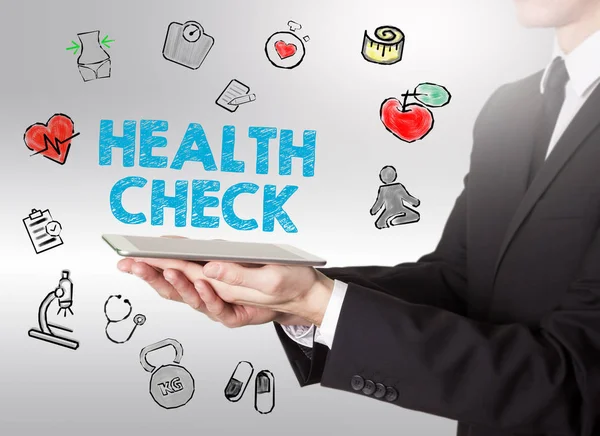 Concetto Health Check. Stile di vita sano sfondo. Uomo con in mano un tablet — Foto Stock