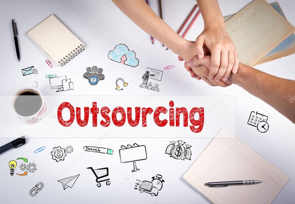 Outsourcing concept. The meeting at the white office table
