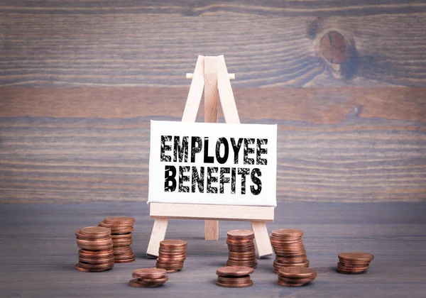 Employee Benefits, Business Concept. Miniature easel with small change