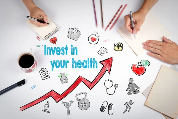Invest in your health concept. Healty lifestyle background. The meeting at the white office table — Stock Image Invest in your health concept. Healty lifestyle background. The meeting at the white office table Stock Picture