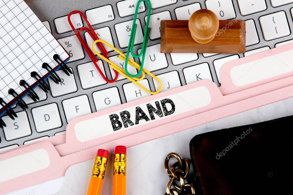 Brand, branding technology concept. Folder Register on Background of Computer Keyboard.