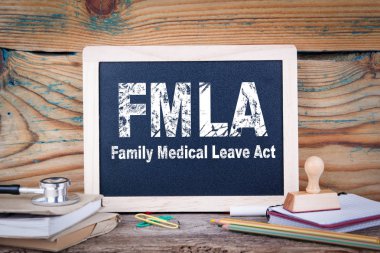 fmla, Aile Sağlık Yasası bırak. Ahşap arka plan kara tahta
