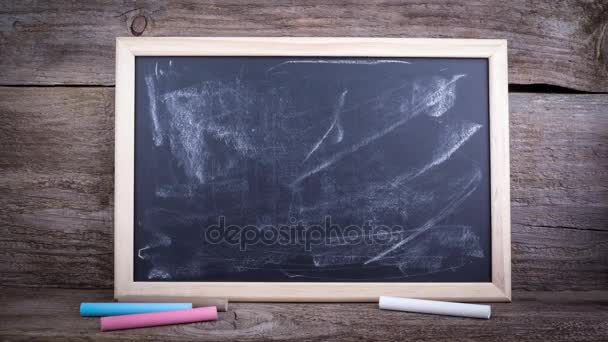 Are You Covered.Text on a chalkboard background — Stock Video