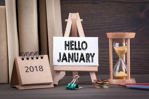 Hello january. Sandglass, hourglass or egg timer on wooden table — Stock Photo, Image