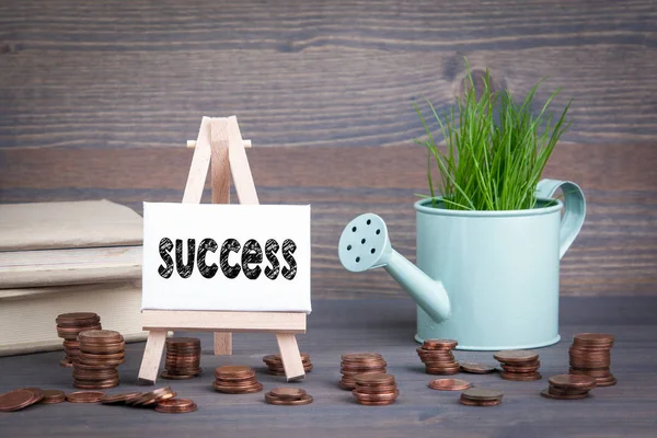 Success, Business Concept. Miniature easel with small change — Stock Photo, Image