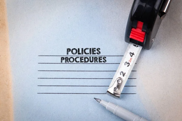 Policies and Procedures. notebook with header. business and success background