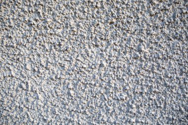 Dokulu arka plan. Dekoratif alçı duvarlar, dış cephe dekorasyonu