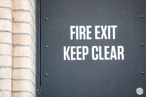 Fire Exit Keep Clear. Fire doors, security, rules and regulations — Stock Photo, Image