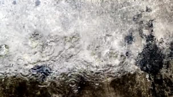 Rain falling on old grunge concrete floor — Stock Video