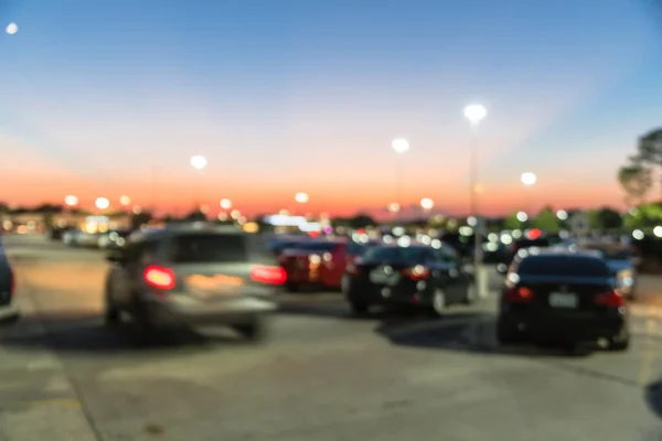 Θολή φόντο υπαίθριο χώρο στάθμευσης των εμπορικών κέντρων στο Χιούστον, Τέξας κατά το ηλιοβασίλεμα — Φωτογραφία Αρχείου