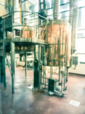 Vintage sesi bulanık görüntü Dallas, Teksas yakınlarındaki yerel restoran tam bir çalışma bira hops. Standart bira stilleri ve mevsimlik bira fermente parlak tankları Satır