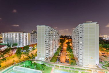 Top view Eunos neighborhood HDB complex in Singapore at evening clipart