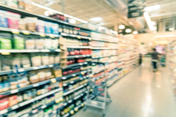 Blurry fondo cliente de compras para hornear suministros en el supermercado en América —  Fotos de Stock