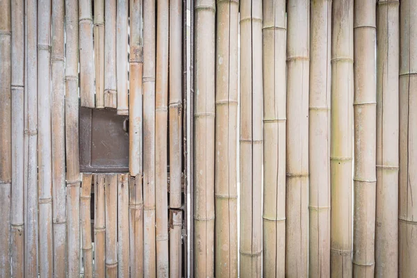 Bamboo wall with windows made from organic bamboo sticks — 스톡 사진