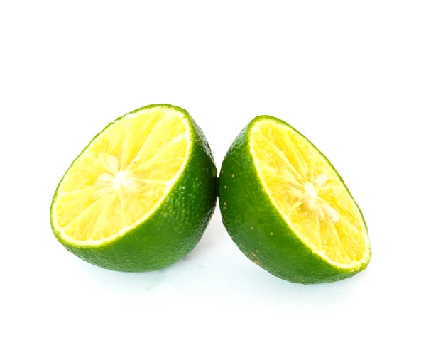 Two half cut limes isolated on white — Stock Photo, Image