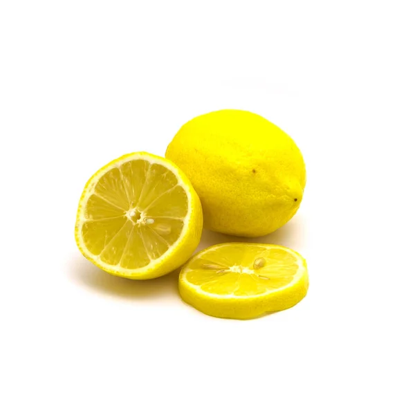 Studio shot one lemon with fresh slice cuts isolated on white — Stok fotoğraf