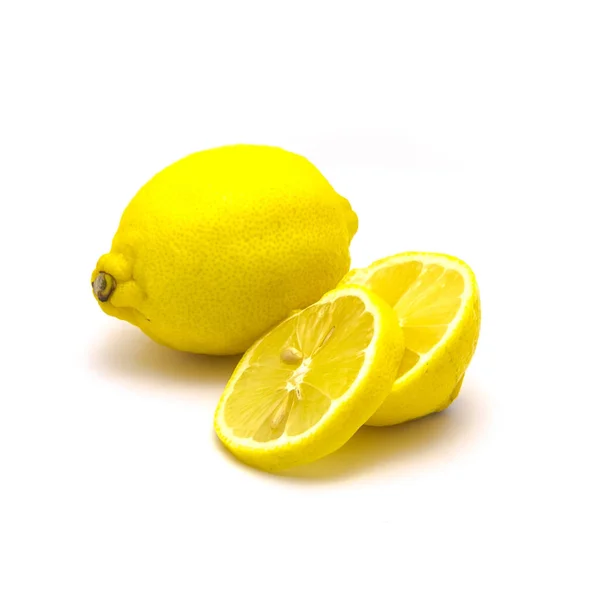 Studio shot one lemon with fresh slice cuts isolated on white — 스톡 사진