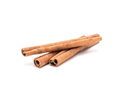 Studio shot three cinnamon stick barks isolated on white