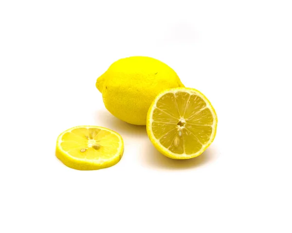 Studio shot one lemon with fresh slice cuts isolated on white — Stok fotoğraf