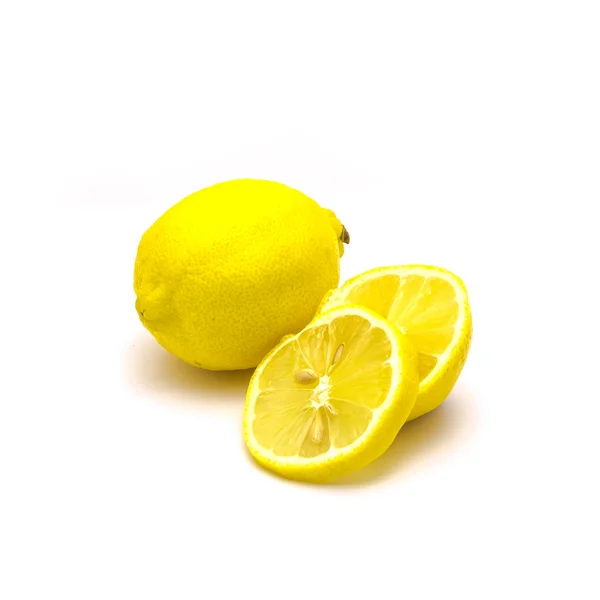 Studio shot one lemon with fresh slice cuts isolated on white — Stok fotoğraf