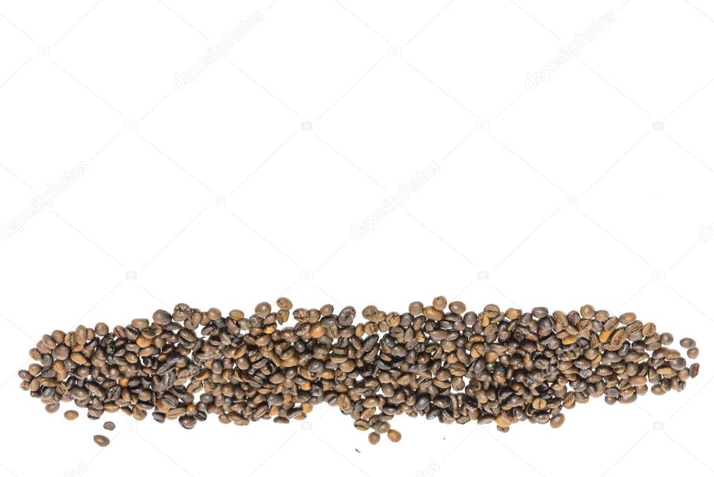 Horizontal view heap of roasted Vietnamese robusta coffee beans isolated