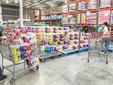 LEWISVILLE, TX, US-FEB 3, 2020: Shoppers stocking bottled water at Costcow Warehouse store. Coronavirus Covid-19 or Wuhan chaos sends people into panic-buying mode