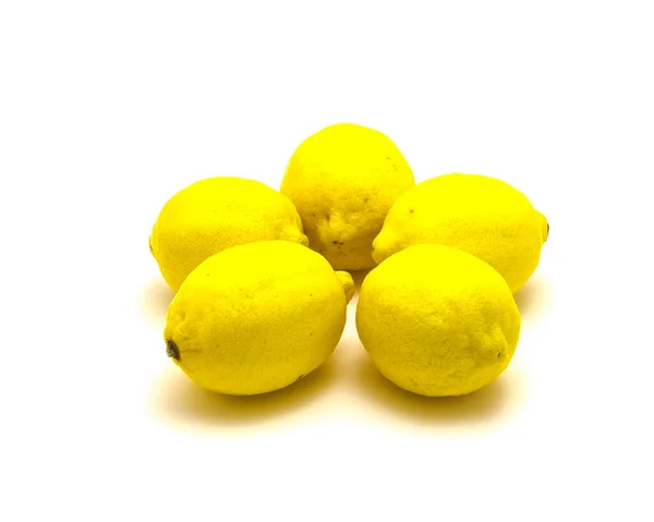 Studio shot five organic raw lemons isolated on white — Stock Photo, Image