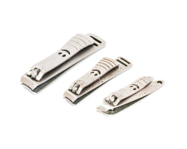 Collection of Vietnamese shiny fingernail and toenails clipper isolated on white
