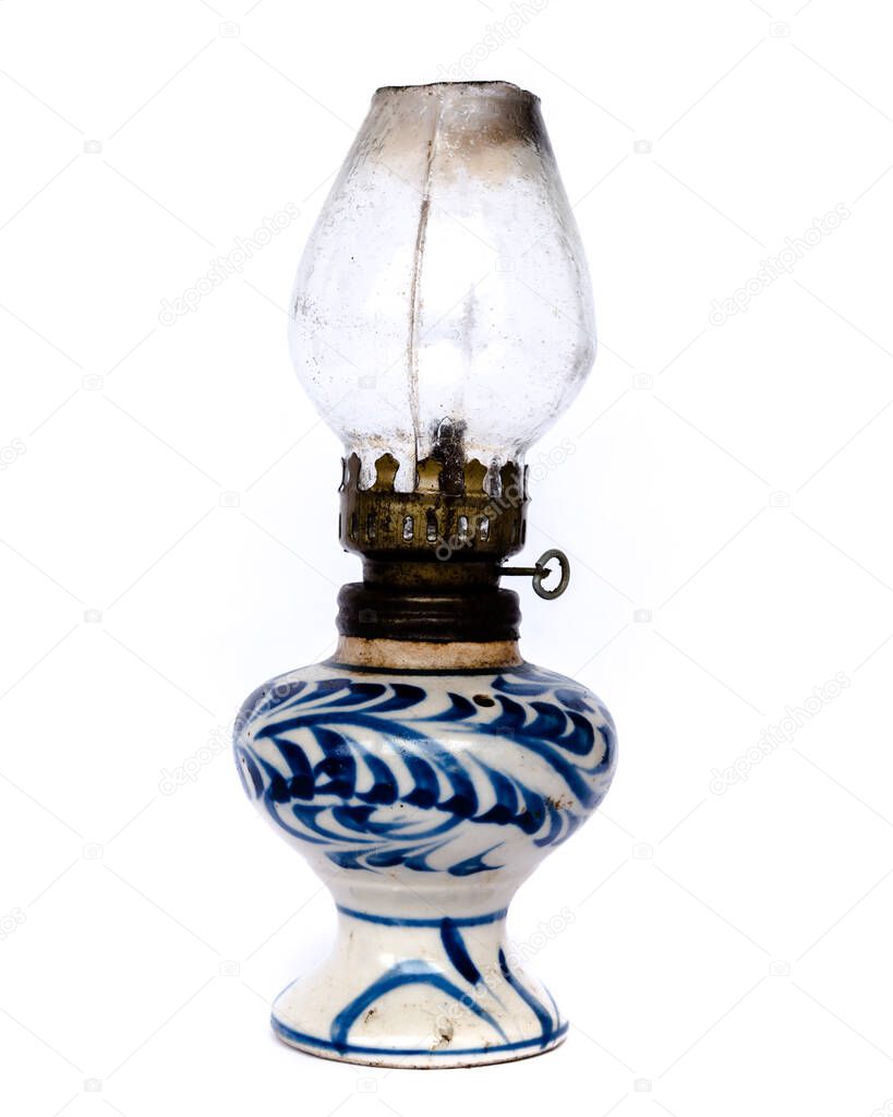 Studio shot traditional Vietnamese oil lamp isolated on white