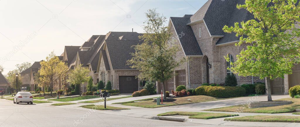 Panoramic view upscale residential neighborhood with two story houses in suburbs Dallas, Texas