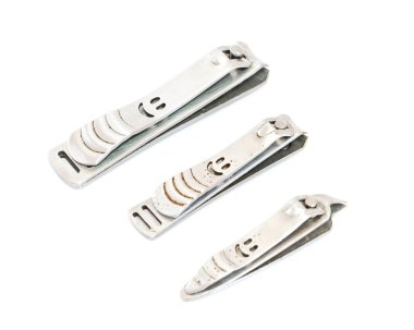 Collection of Vietnamese shiny fingernail and toenails clipper isolated on white
