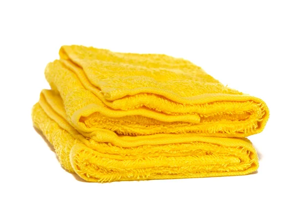 Toallas amarillas aisladas en blanco con copyspace —  Fotos de Stock