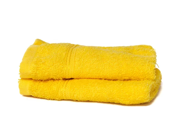 Toallas amarillas aisladas en blanco — Foto de Stock