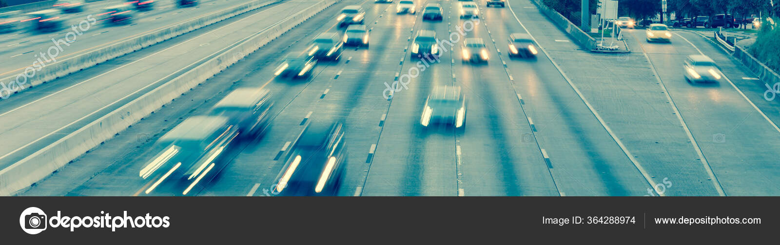 Rush hour traffic on frontage road and Southwest freeway in downtown