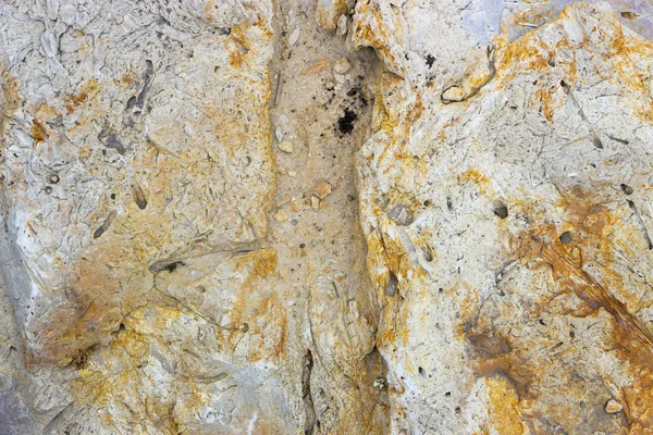 Il tufo è una pietra vulcanica. primo piano sfondo texture — Foto Stock