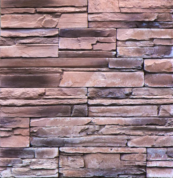 Telhas de parede de concreto na forma de tijolos decorativos — Fotografia de Stock