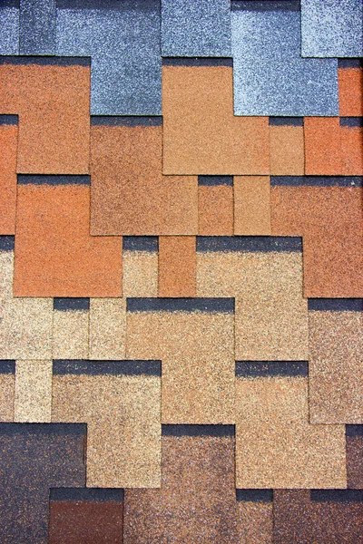 Concrete roofing tiles in sample colors and patterns