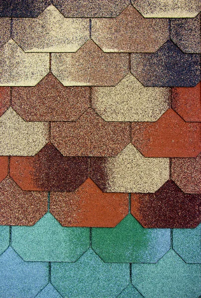 Concrete roofing tiles in sample colors and patterns