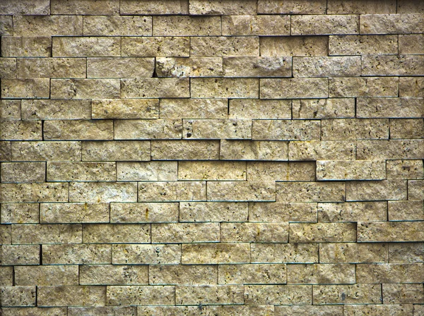 Wall of the small granite blocks — Stock Photo, Image