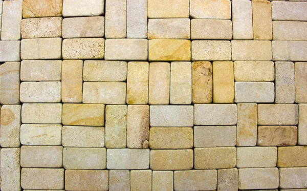 Konsistens av gul sandsten tegelstenar närbild, — Stockfoto