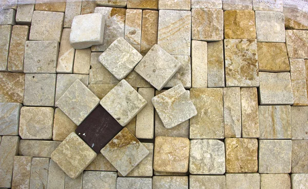 Textur aus gelben Sandsteinsteinen in Nahaufnahme, — Stockfoto