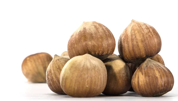 Lískové ořechy closeup na světlém pozadí — Stock fotografie