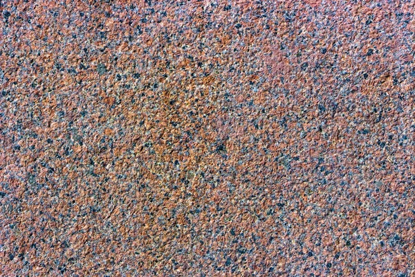 Gránit textúra, vörös bázis fekete-szürke foltokkal — Stock Fotó